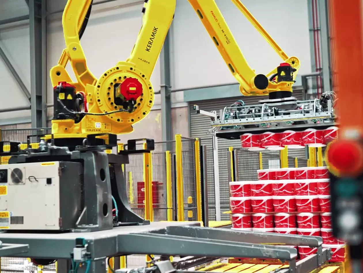 Robotic Palletizing and Stretch Wrapping Line with FANUC Robot M-410iC/185. 