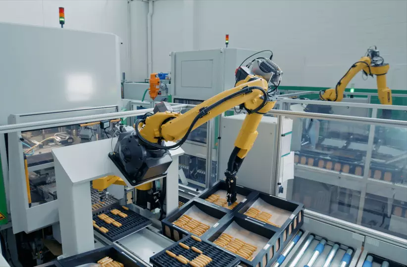 Success story about automated placing into packaging trays using FANUC robots by the Swiss company Kunststoff-Packungen AG. 

FANUC enabled Kunststoff-Packungen AG to run the manufacturing line autonomously, with autonomous operation for at least 8 hours at full speed, achieving cycle times of 0.8 seconds. The project involved two FANUC robots: a six-axes M-10iD/10L with a payload of 10 kg, and a four-axes SR-6iA robot with a 6 kg payload. Significant space saving was achieved because of the compact footprint of the solution.