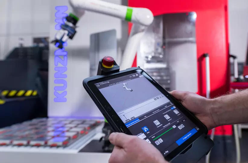 Kunzmann Case Study pictures: the machine tools builder introduced a FANUC CRX collaborative robot to facilitate both training and production activities