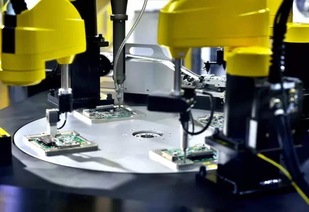 Close-up of circuit board at production line.
1170628756
Microchip and microprocessor assembly with automated robotic arm factory equipment, electronics and component installation on circuit board