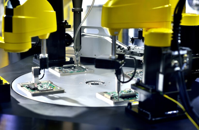 Close-up of circuit board at production line.
1170628756
Microchip and microprocessor assembly with automated robotic arm factory equipment, electronics and component installation on circuit board