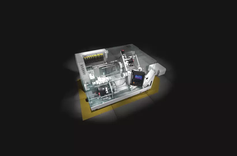 3D image showing a ghost CNC machine equipped with FANUC components. Industrial hall background. High Resolution.