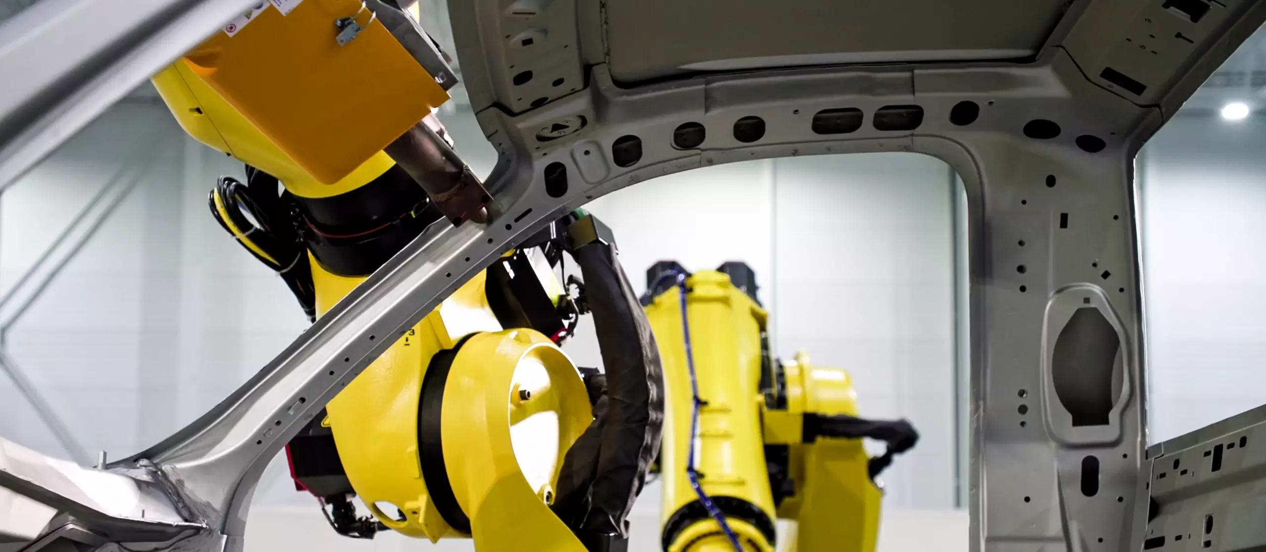 Snapshot from FAC video ''R-2000 Spot Welding'' with FANUC R-2000iD-210FH.