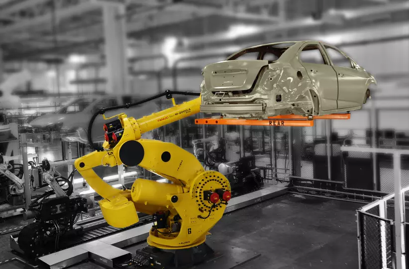 FANUC M-2000/900F-47A in a car body transfer application.
The FANUC M-2000/900F-47A is a heavy-duty robot designed for high-performance handling applications.