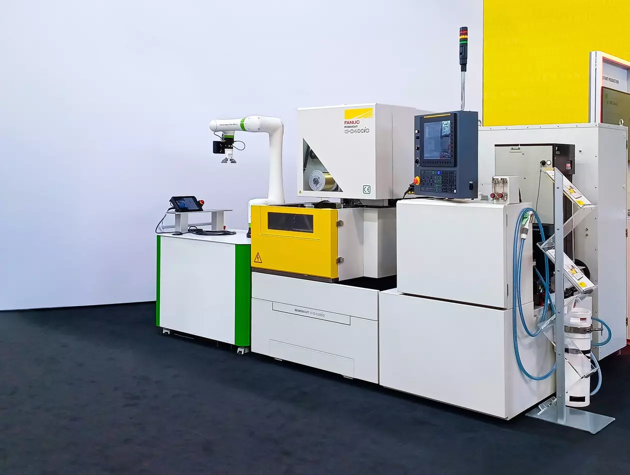 FAKUMA 2023. Mould part production.  ROBOCUT α-400iC with CRX-20iA/L