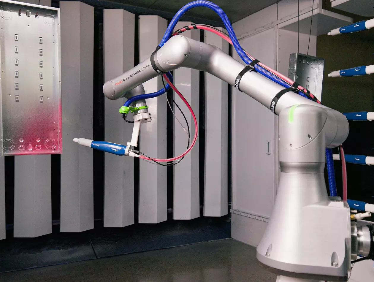 Image of CRX-10iA/L Paint painting an electric panel box.