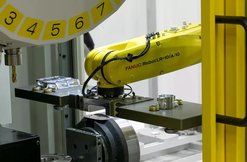 Machine tending with FANUC Robot. FANUC CRX Robot loading/unloading FANUC Robodrill machining center.