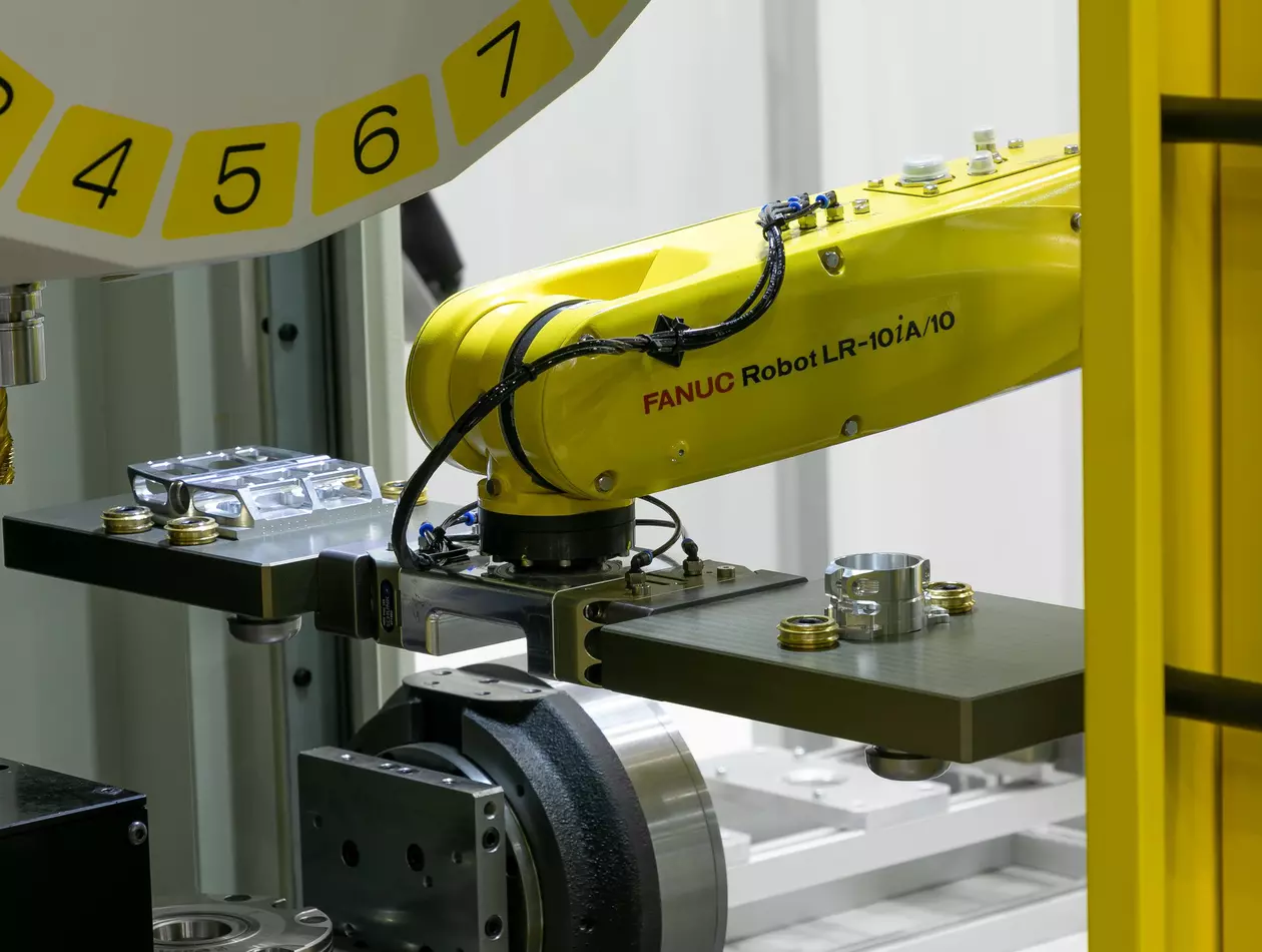 Machine tending with FANUC Robot. FANUC CRX Robot loading/unloading FANUC Robodrill machining center.