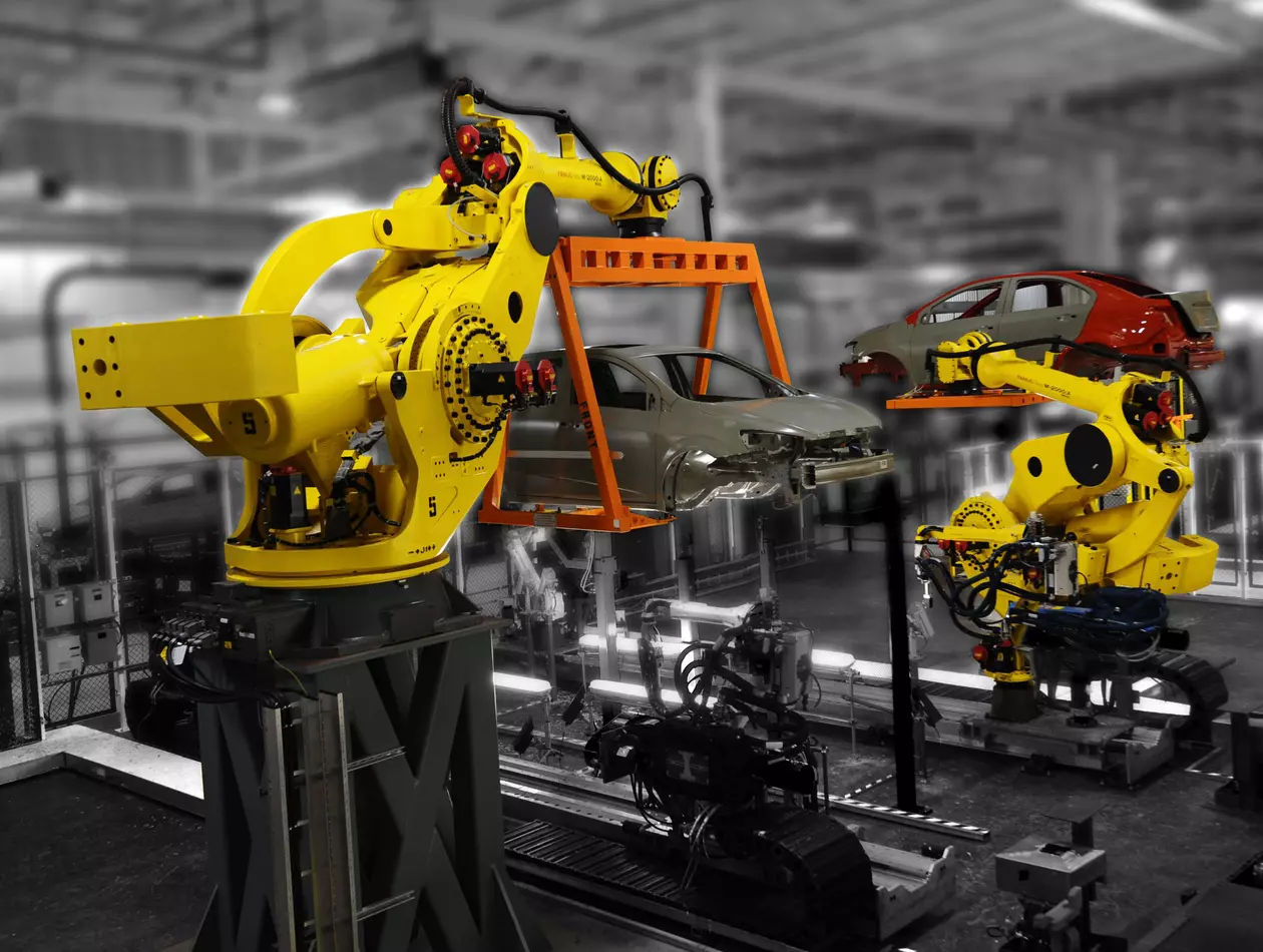 FANUC M-2000/900F-47A in a car sealer and transfer application. The FANUC M-2000/900F-47A is a heavy-duty robot designed for high-performance handling applications.