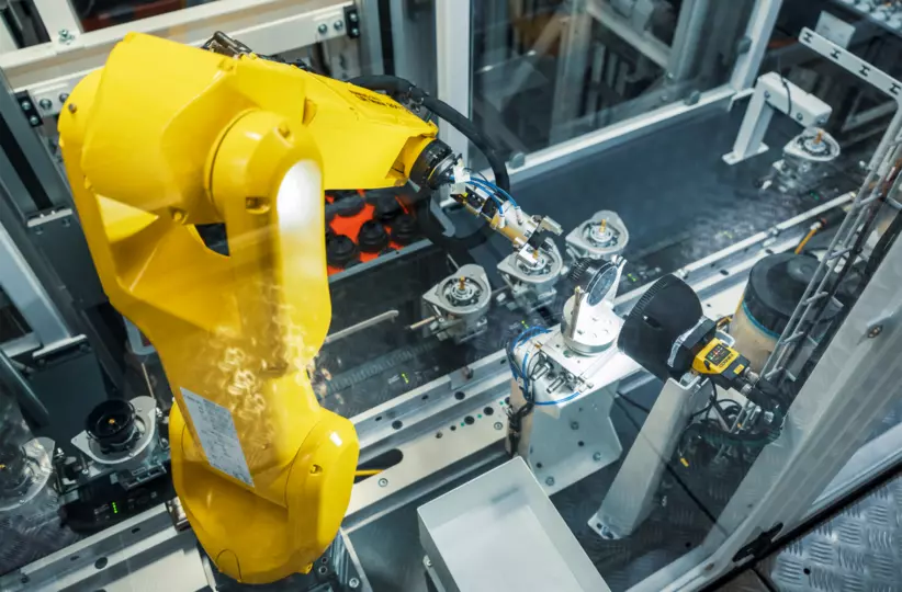 Images Eugster/Frismag Case Study. Assembling of coffee grinders with LR Mate 200iD/7L and handling with M-20iD/25 in combination with ZDT.