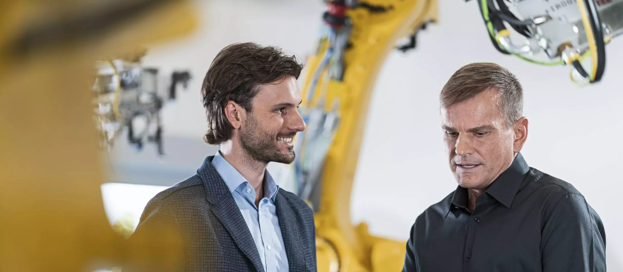 FANUC service employee trains a customer 