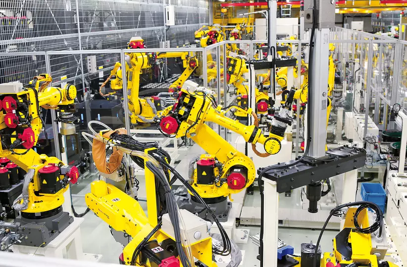 FANUC Servo Motor Factory at Mibu.
The latest robotized factories integrating FANUC’s technologies boast a high level of automation in retrieving parts, assembling, testing, and packaging, leading to efficient production.