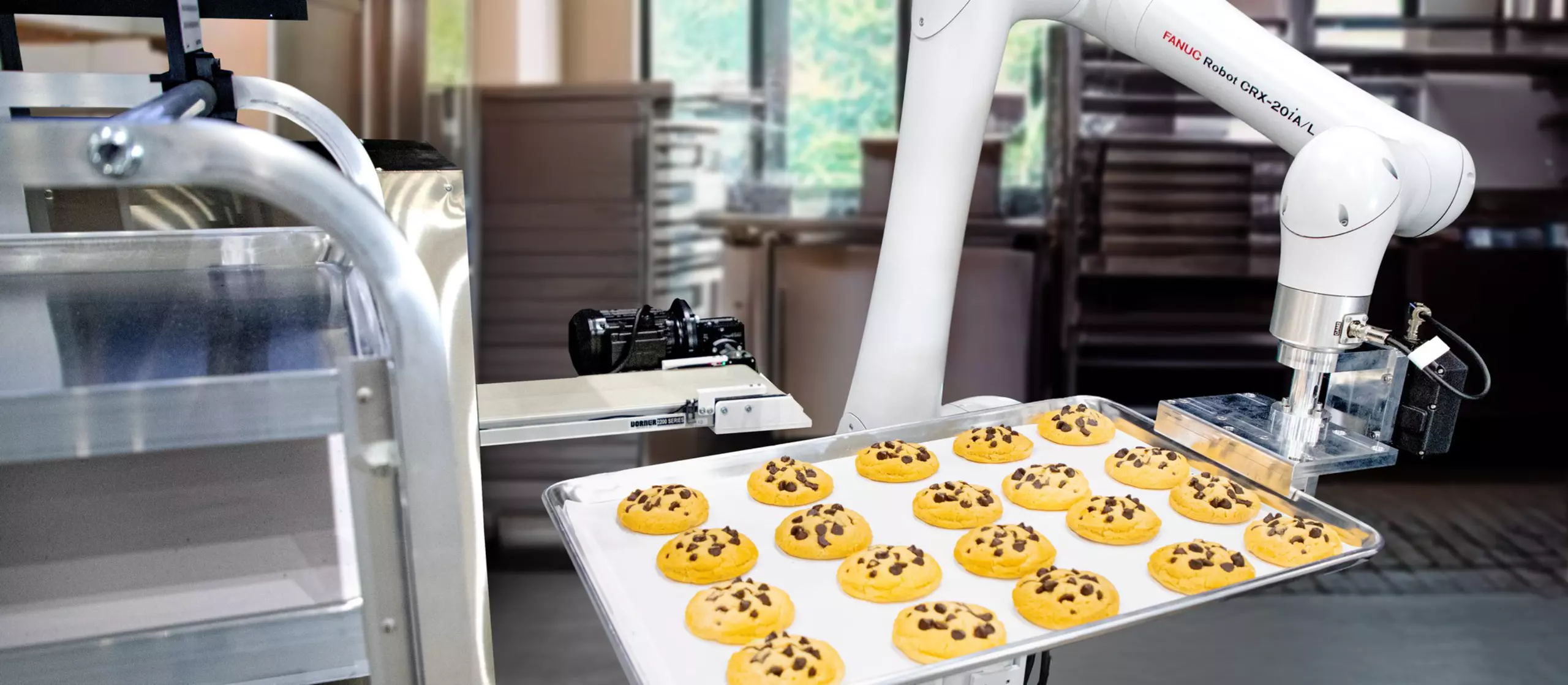 Image of CRX-20iA/L Food Grade - Loading and Unloading Cookie Trays. Jpeg.