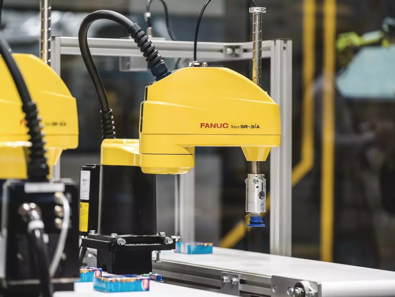 The FANUC SR-3iA robot picking peanuts.