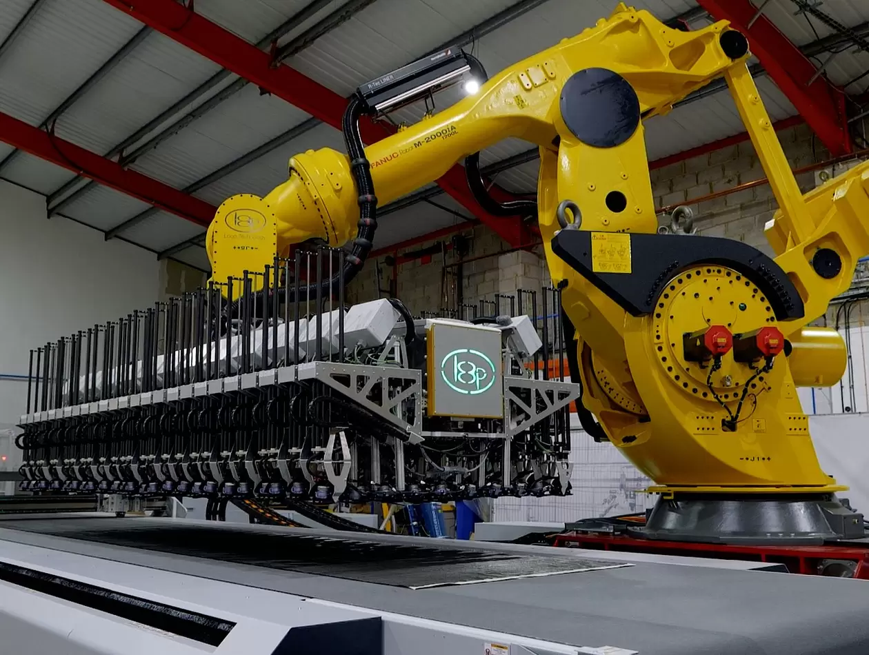 Loop Technology case study picture.
M-2000 series supports the development of Loop Tehcnology FibreLINE composite preform automation system for the aerospace sector. The robots handle large, complex end effectors with exceptional precision, helping deliver breakthrough deposition rates, better cell access and repeatable quality for next-generation aircraft structures.