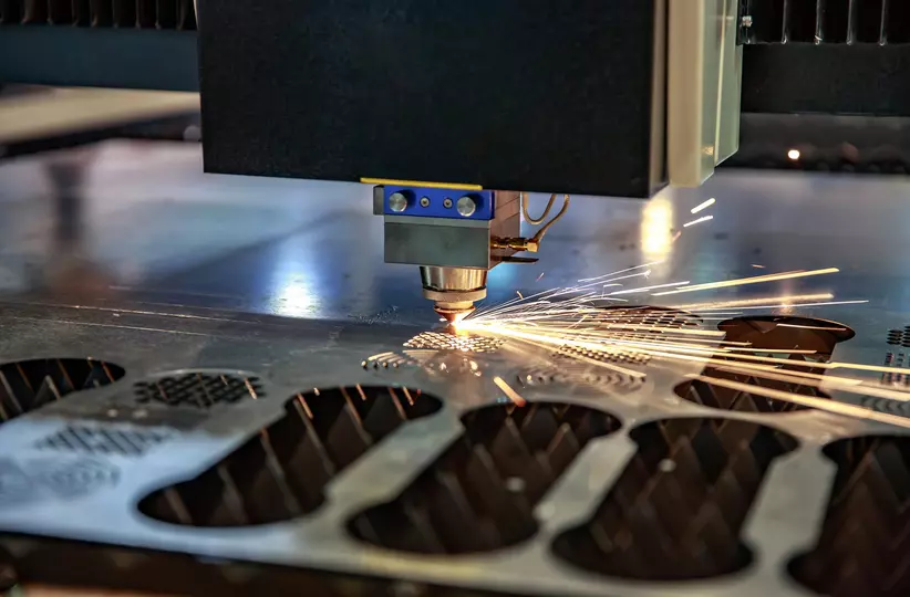 Stock image of CNC laser cutting.
CNC Laser cutting of metal, modern industrial technology.
Small depth of field. Warning - authentic shooting in challenging conditions. A little bit grain and maybe blurred.