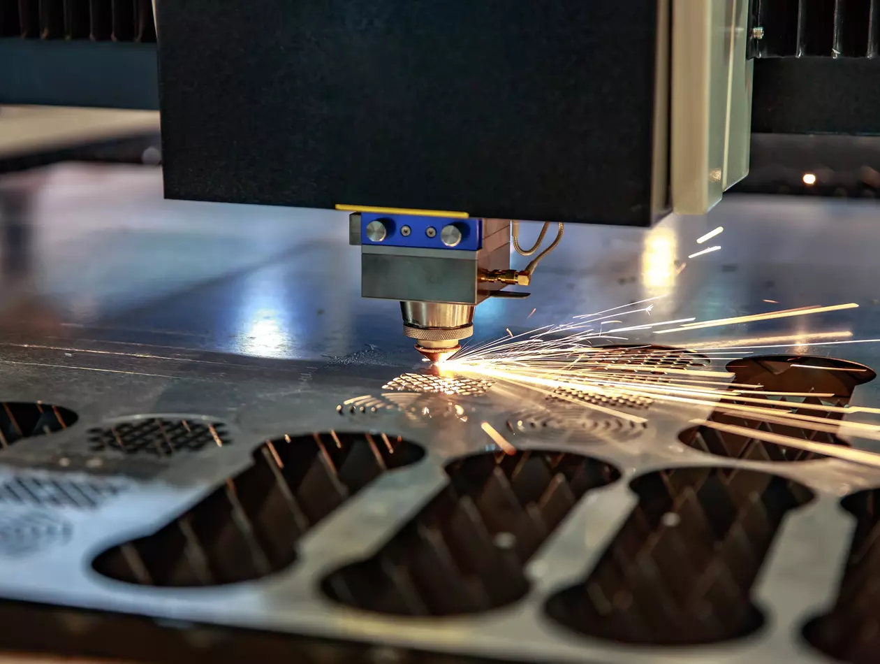 Stock image of CNC laser cutting.
CNC Laser cutting of metal, modern industrial technology.
Small depth of field. Warning - authentic shooting in challenging conditions. A little bit grain and maybe blurred.