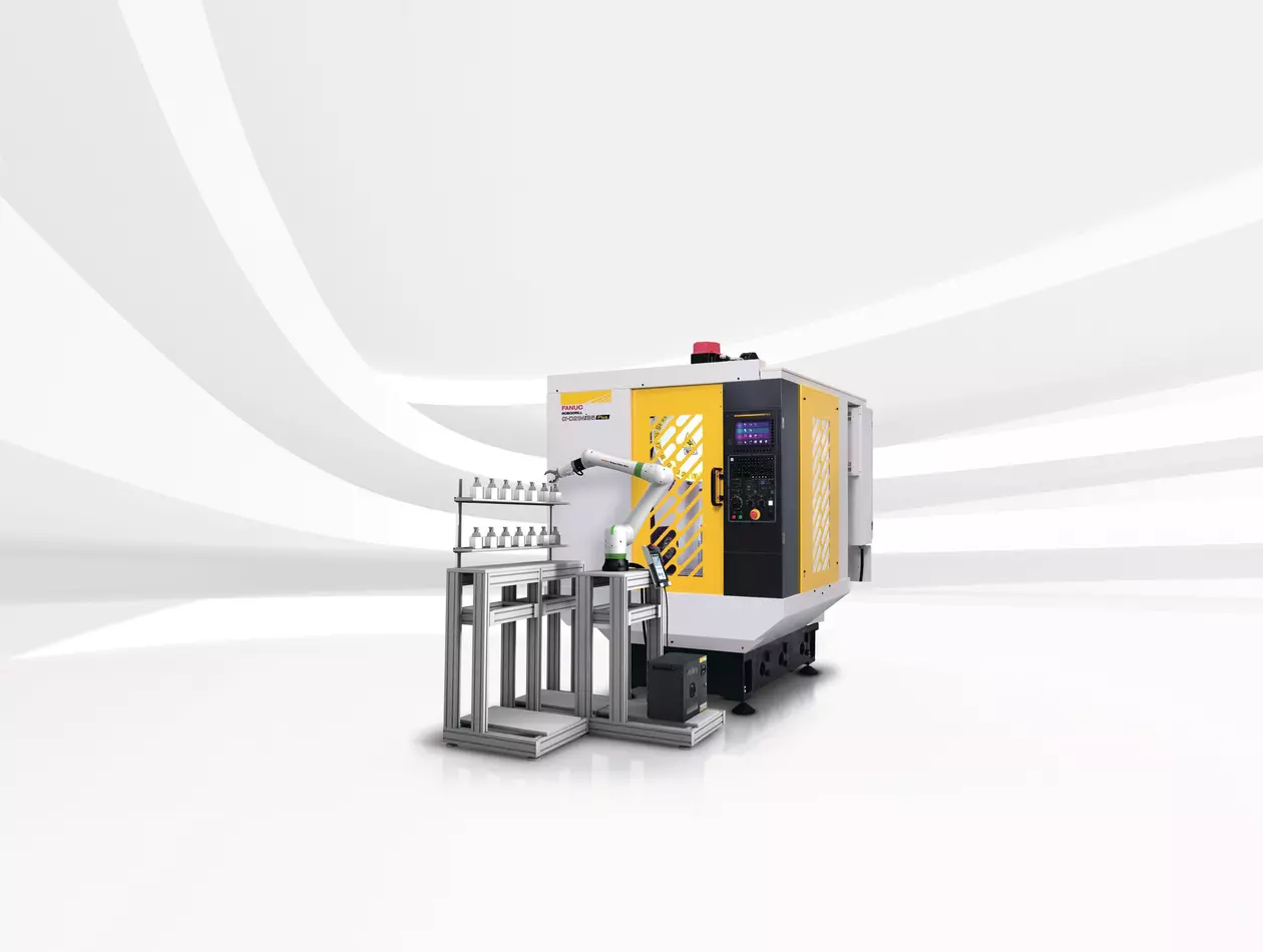 Machine tending with FANUC Robot. FANUC CRX Robot loading/unloading FANUC Robodrill machining center.