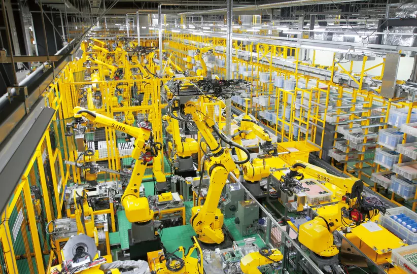 CNC Factory at FANUC Headquarters. FANUC Robots are used abundantly for complex assembly tasks which only humans could perform in the past.