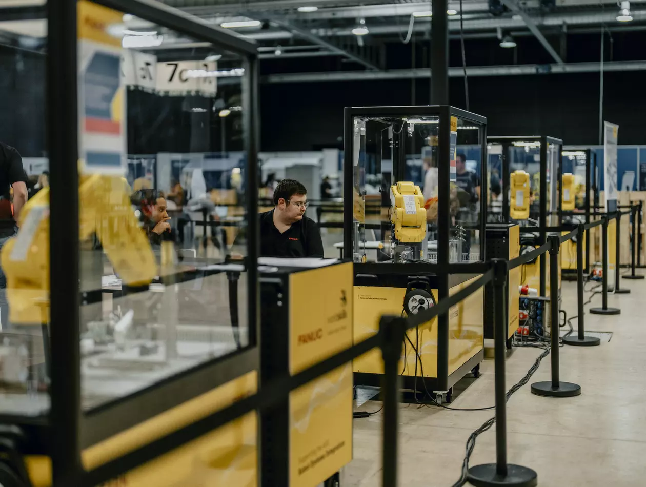 Competition at Worldskills Robots Systems Integrator Skills with FANUC LR Mate cells
