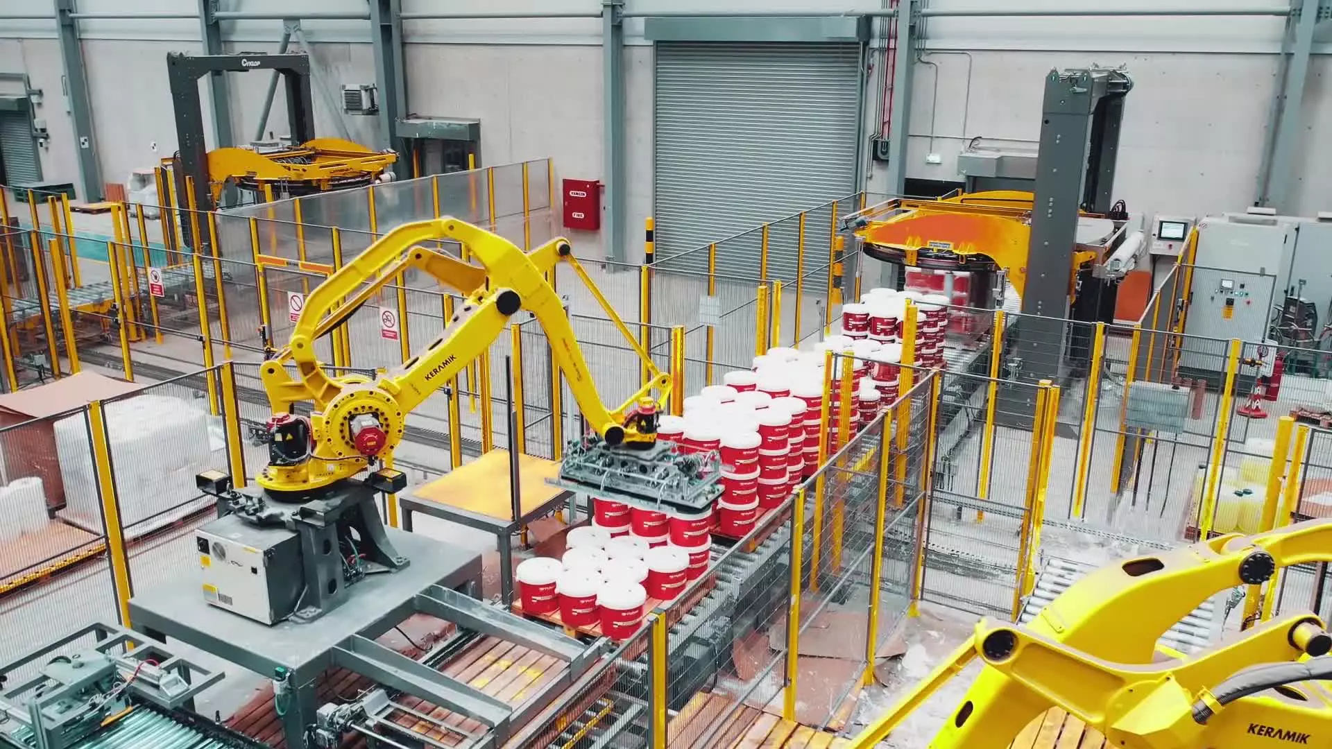 Robotic Palletizing and Stretch Wrapping Line with FANUC Robot M-410iC/185. 